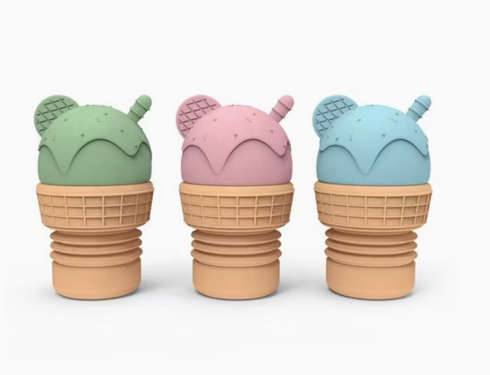 Three ice cream cone-shaped bath toys with colorful lids that are removable