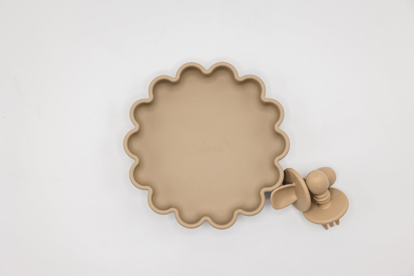 Suction base securely attaches to tabletop, preventing spills during mealtime.