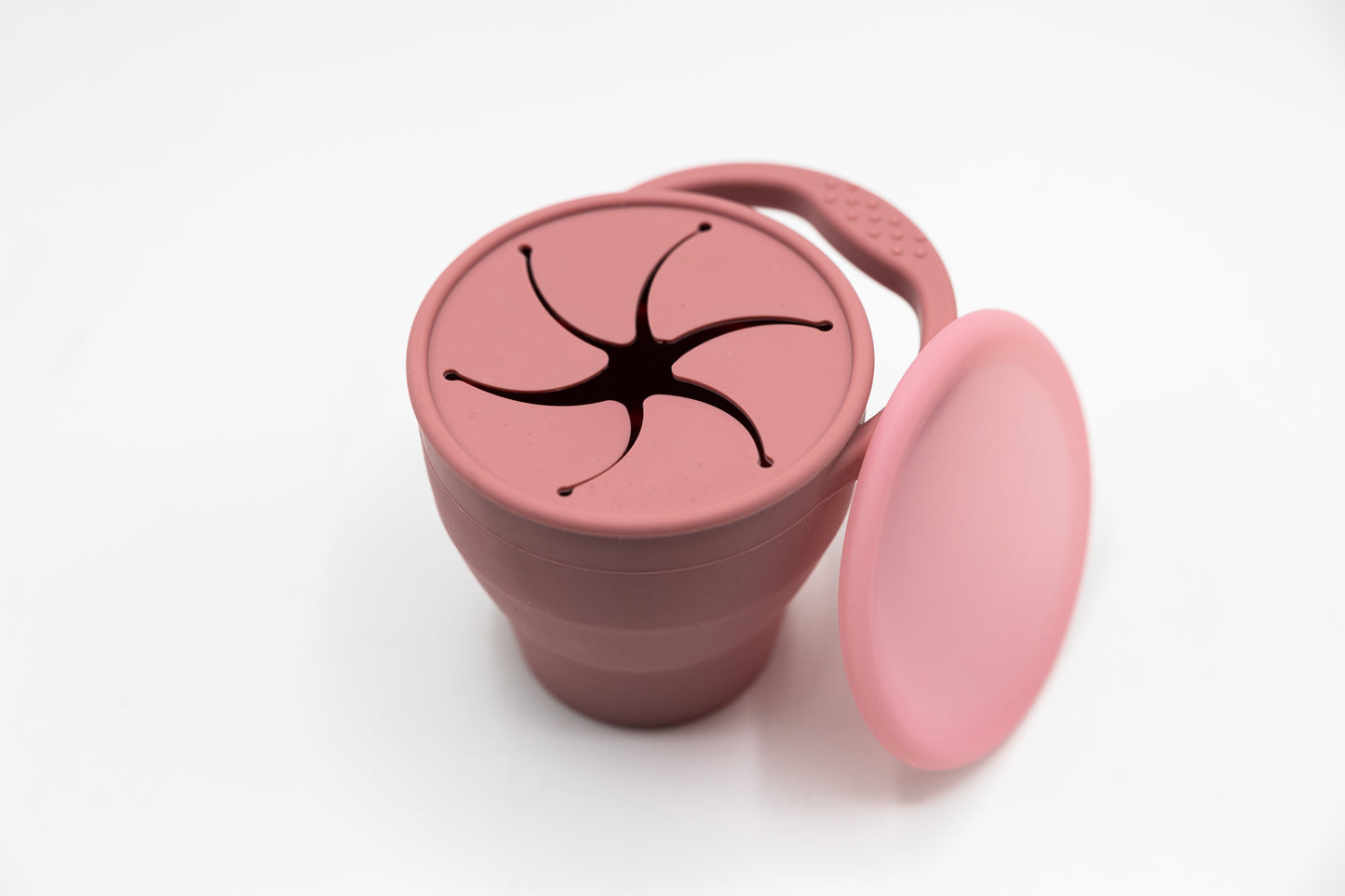 dishwasher-safe collapsible snack cup for easy cleaning and reuse.