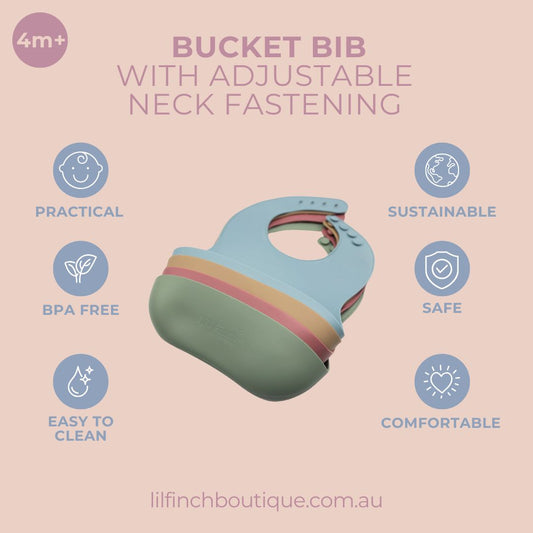 Adjustable bucket bib with light blue body, green pocket, and snap neck strap.