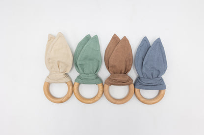 Four-color bunny ear teether set with fabric ears and wooden teething rings
