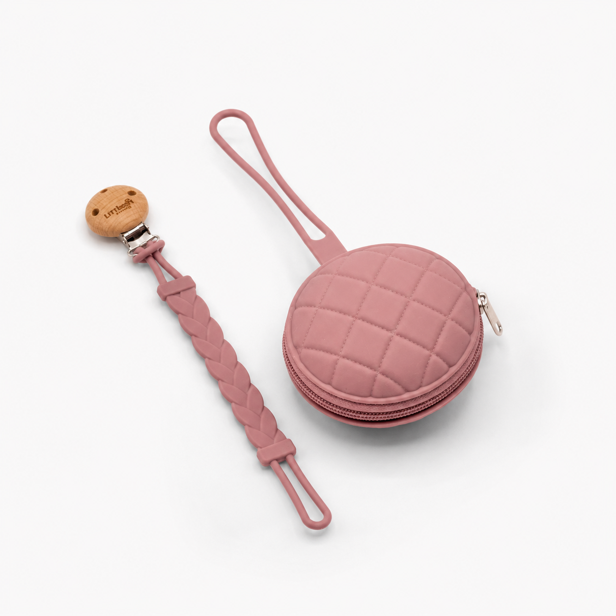 Pink round dummy case with a strap and matching pink silicone dummy clip 