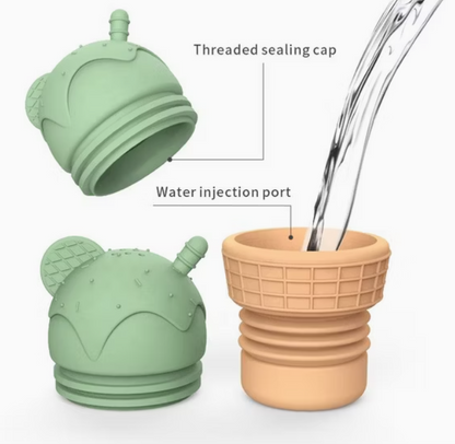 Green ice cream bath toy showing cap, water port, and stacked base parts