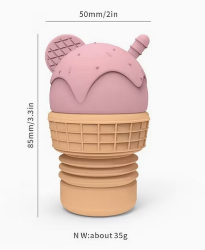 Pink ice cream bath toy with squeeze top and textured waffle lid