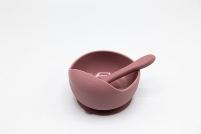 Rose suction bowl with spoon, bowl interior and rim visible
