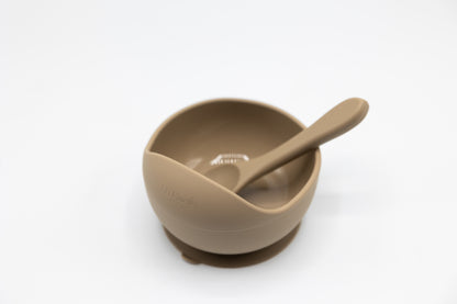 Latte suction bowl with spoon, bowl interior and rim visible