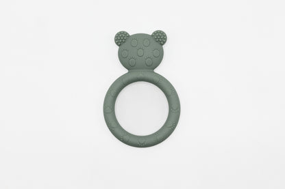 Sage green teddy bear teether with embossed bear face and circular ring