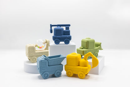 Five construction bath toy vehicles on a platform, including dump truck, mixer, and loader