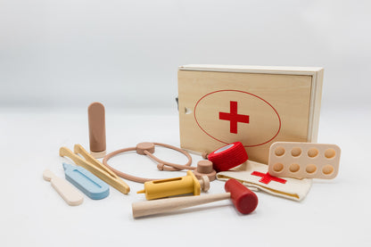 Wooden doctor play medical kit with stethoscope, pill tools, and display case