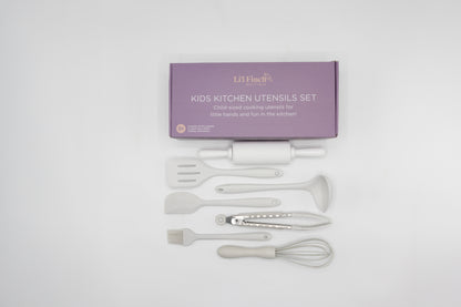 Kids kitchen utensil set with white cooking tools and whisk in package