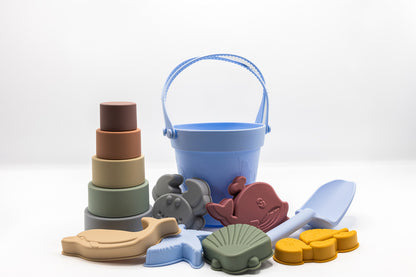 Colorful toy bucket with animal molds and stacked silicone cups, blue