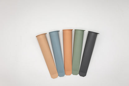Popsicle mold tubes, five-pack fanned in beige, blue, peach, green, and black