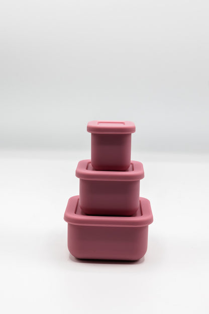 Stacked silicone snack boxes with lids, powder rose color