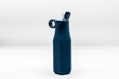 Navy blue water bottle with flip-top spout and circular handle detail