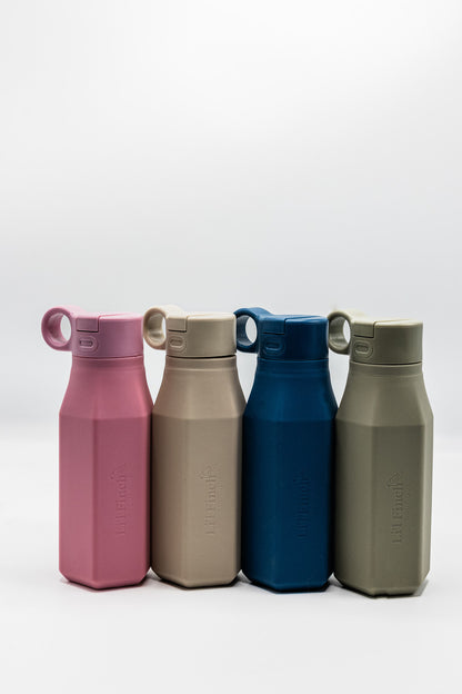Four water bottles with flip-top spouts in pink, beige, navy blue, and olive