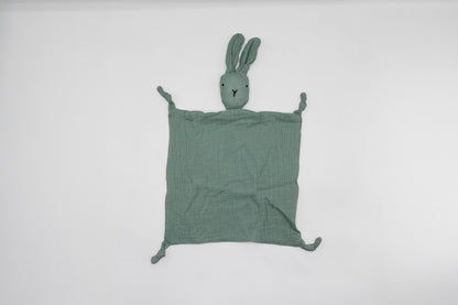 Sage green snuggle bunny comforter with stitched bunny head at top and corner ties